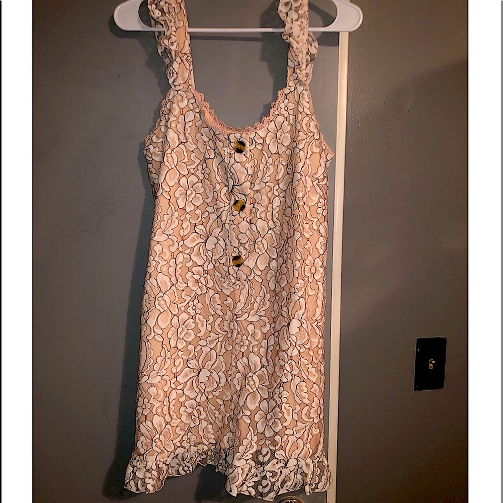 Pink and white floral romper originally from Nana macs. Never worn!